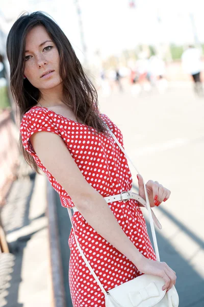 Stock image Beauty young woman on the bridge