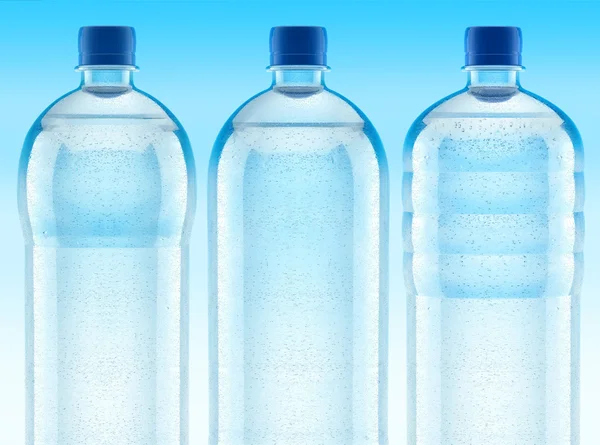 Empañado botellas plásticas con agua clara —  Fotos de Stock