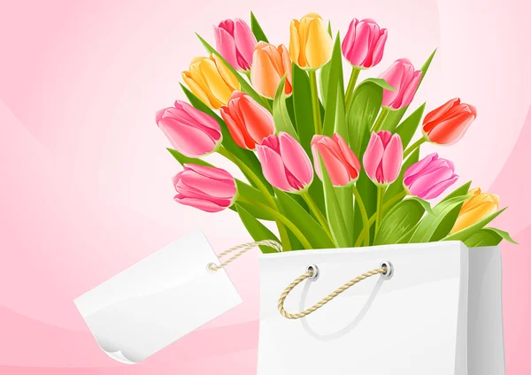 Buquê de flores de tulipa na bolsa com rótulo em branco — Vetor de Stock
