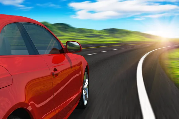 Red car driving by autobahn — Stock Photo, Image
