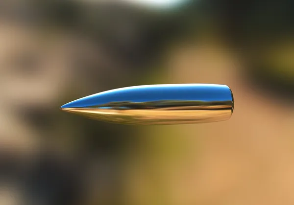 Stříbrná kulka v letu — Stock fotografie
