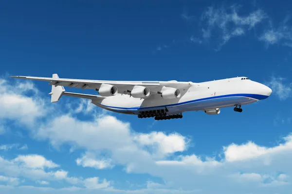Grande avião de carga no céu bue com nuvens — Fotografia de Stock
