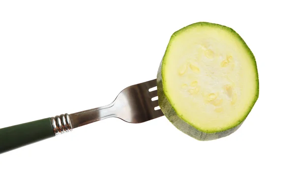 Green squash on a fork — Stock Photo, Image