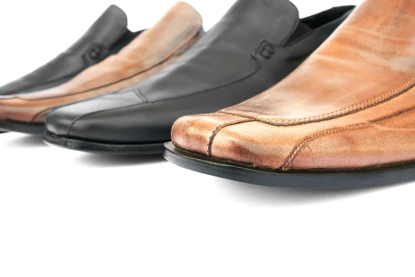 Bruna och svarta skor — Stockfoto