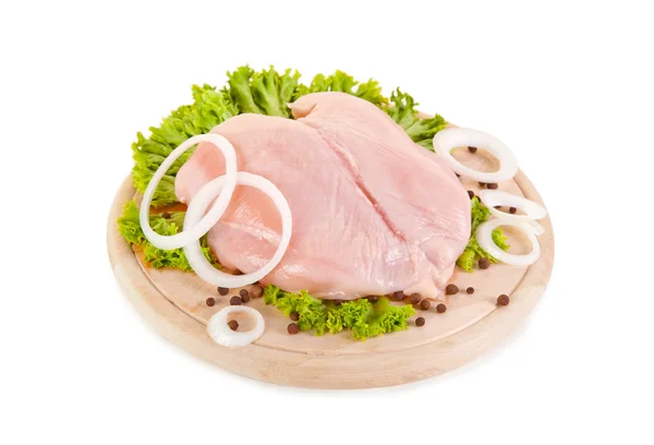 Fresh raw chicken breasts on chopping board — Stock Photo, Image