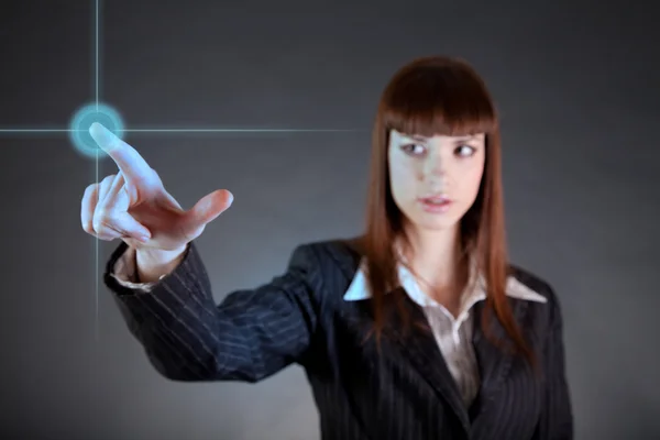 Affärskvinna som pekar på sensorn skärmen — Stockfoto