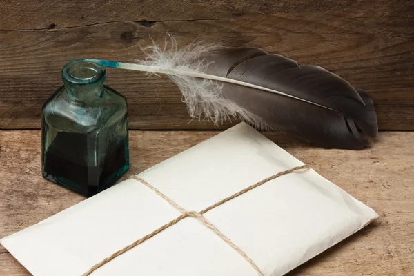 Stack of books and quill — Stock Photo © Observer #5112575