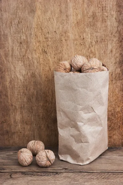 Walnuts in a kraft paper bag