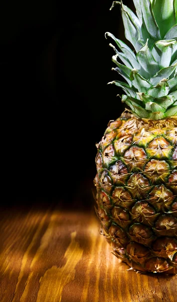 stock image Copyspace view of ananas on wooden board