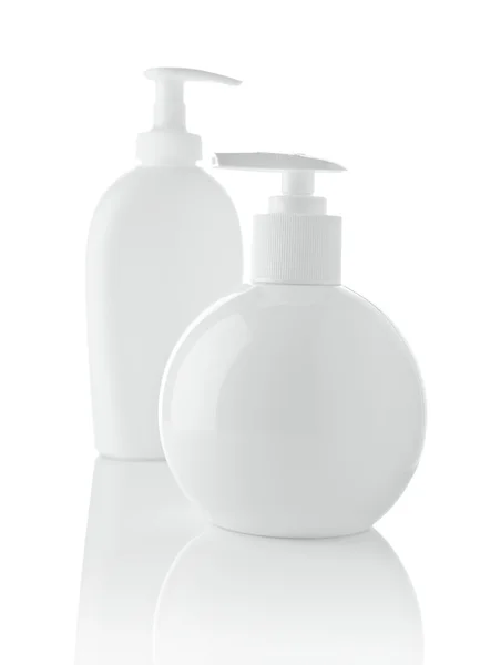 Na białym tle biały spray butelkach — Zdjęcie stockowe