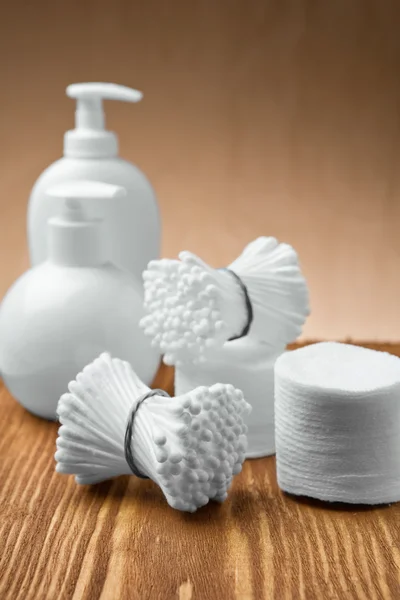 Swabs and pads with bottles — Stock Photo, Image