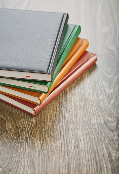 Notebooks on wooden board — Stock Photo, Image