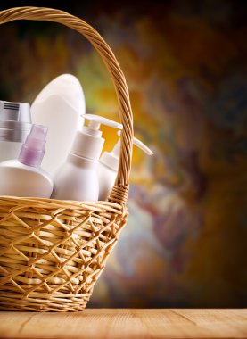 Skincare items in wicker basket clipart