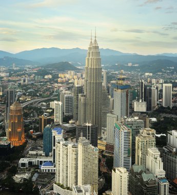 Kuala Lumpur at sunset clipart