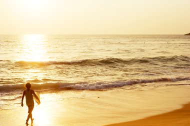 Surfer on the beach clipart