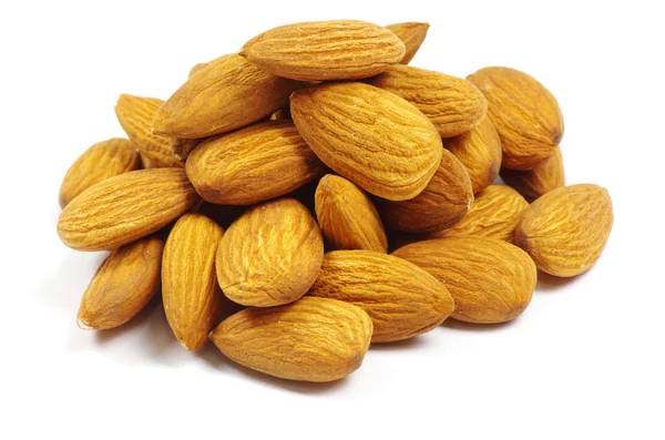Almonds on a white — Stock Photo, Image