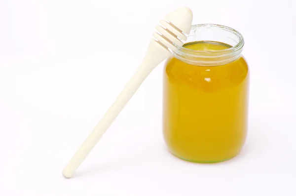 Honung och stick — Stockfoto