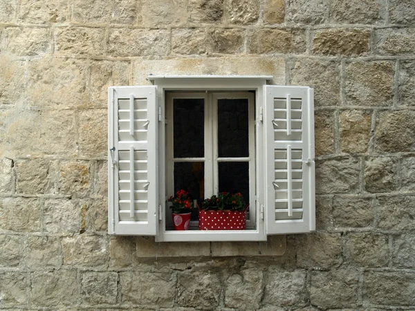 Window on stone wall — Stock Photo, Image