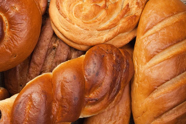 Variedade de fundo de pão fresco — Fotografia de Stock