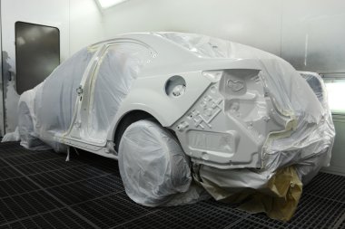 Car in the spray booth clipart