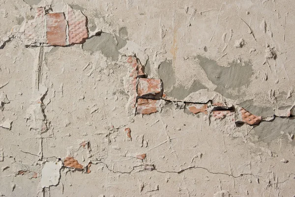 Bakgrunn fra høye detaljerte fragmentsteinsmurer – stockfoto