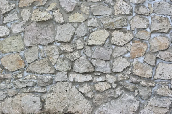 Sfondo da alto frammento dettagliato muro di pietra — Foto Stock