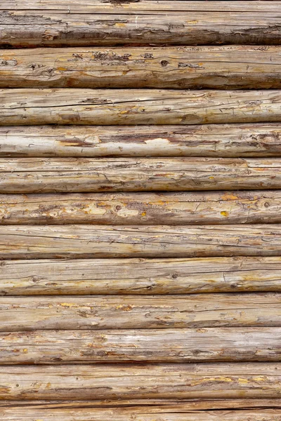Bûches de bois mur de fond de maison rurale — Photo
