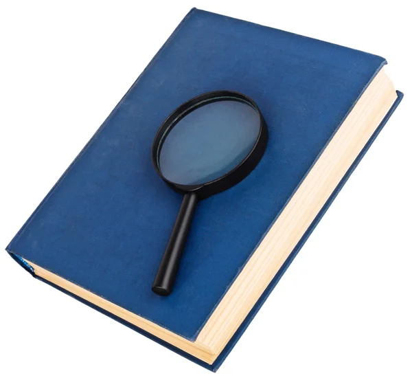 Blue book and magnifying glass — Stock Photo, Image