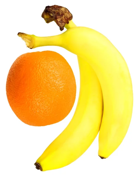 Два банана и апельсин — стоковое фото