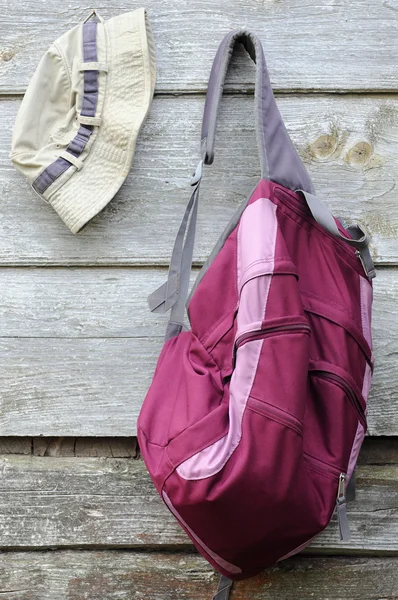 stock image Khaki Hat and Purple Backpack