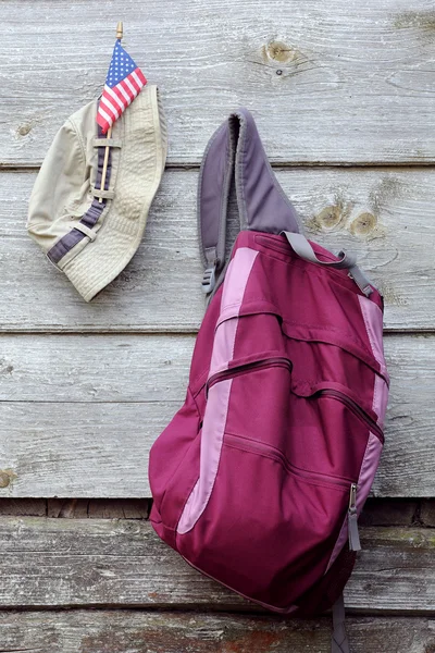 stock image Khaki Hat, US flag and Magenta Backpack