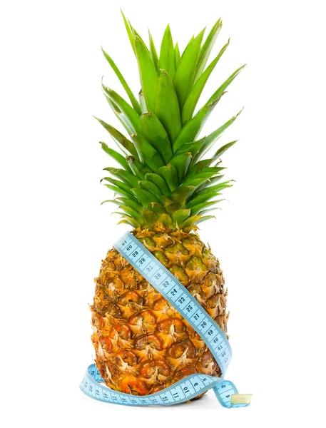 Pineapple with a measuring tape around — Stock Photo, Image