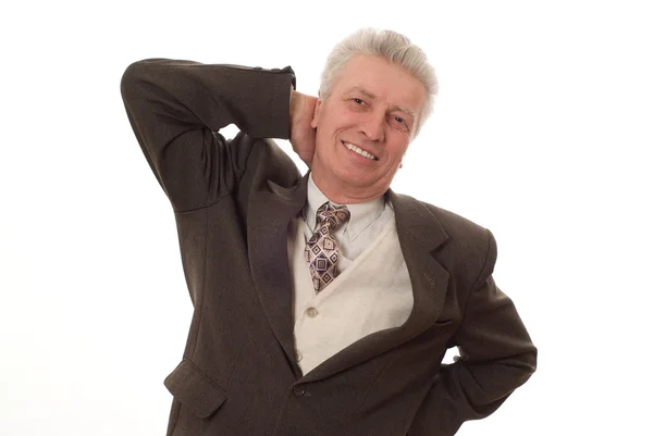 Closeup of a smiling business man pointing upwards — Stock Photo, Image