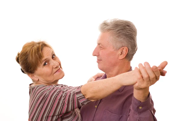 Nice old couple dancing on a white — Stock Photo, Image