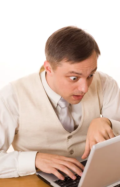 Man aan het werk met laptop op witte achtergrond — Stockfoto