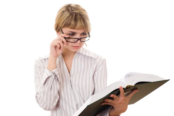 Mooie jonge student met een boek op wit — Stockfoto