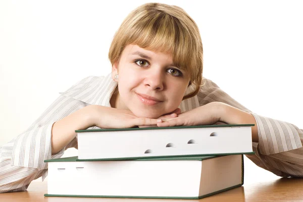 Estudante bonita com um livro sobre branco — Fotografia de Stock