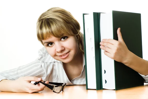 Giovane studente con un libro sul bianco — Foto Stock