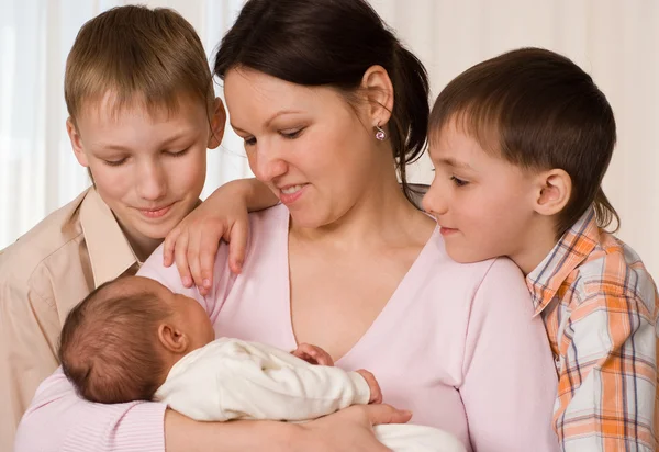 Mother with three children — Stock Photo, Image