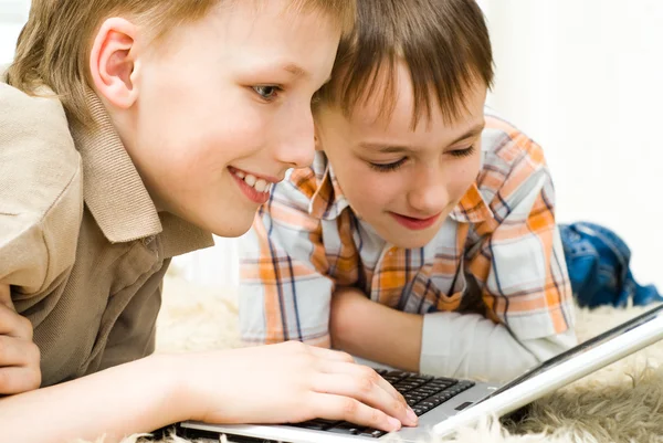 Brothers with laptop — Stock Photo, Image