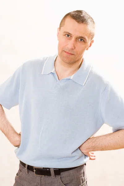 Boring man standing on a white — Stock Photo, Image