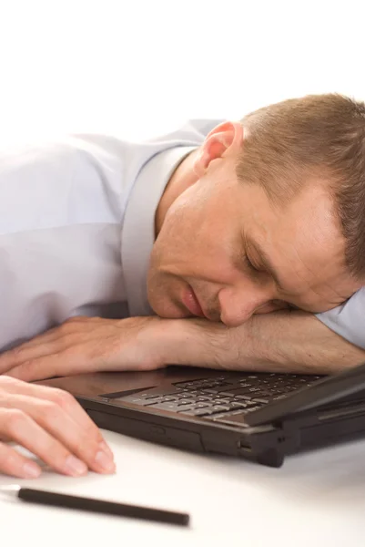Homem dormindo com laptop — Fotografia de Stock