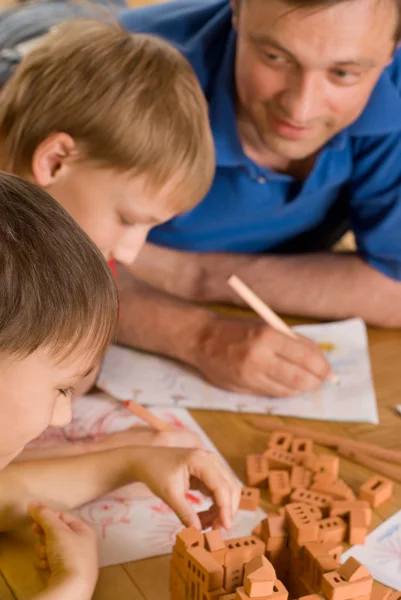 Father with children playing — Stock Photo, Image