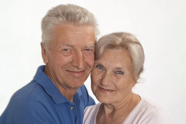 Elderly couple on a white — Stock Photo, Image