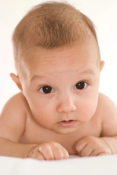 Pasgeboren baby op een wit — Stockfoto