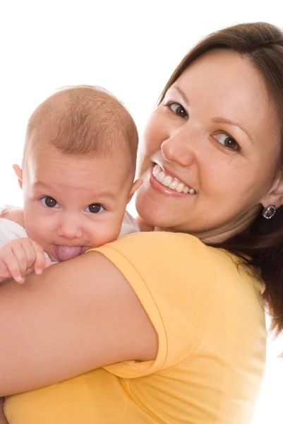 Mãe em amarelo segurando recém-nascido — Fotografia de Stock
