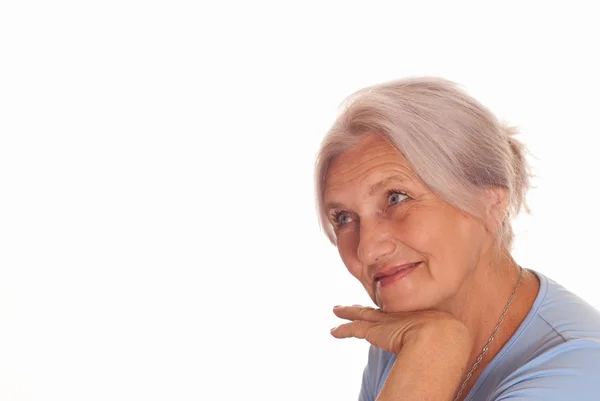 Пожилая женщина в синем — стоковое фото