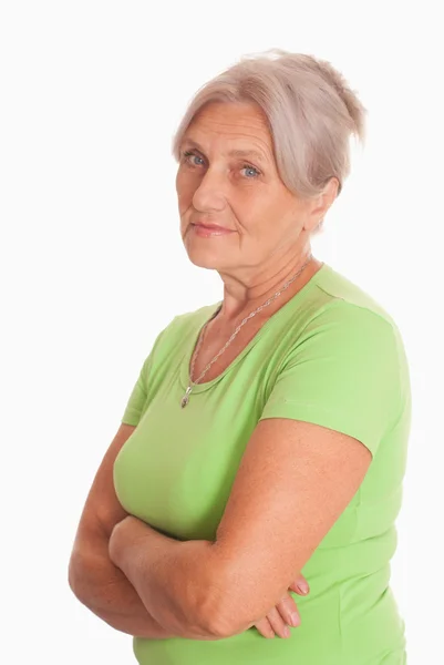 Συμπαθητική ηλικιωμένη γυναίκα στο πράσινο — Φωτογραφία Αρχείου