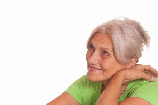 Beautiful older woman in green — Stock Photo, Image