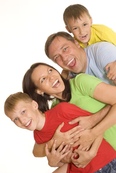 Famiglia felice in vestiti a colori — Foto Stock